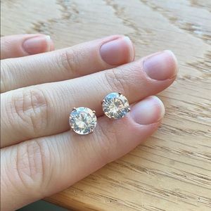 Fake extra large diamond stud earrings